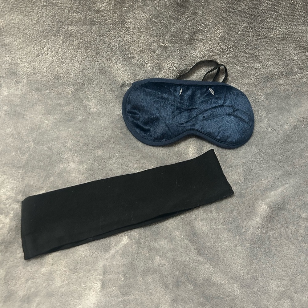 Black hair band and blue sleep eye mask